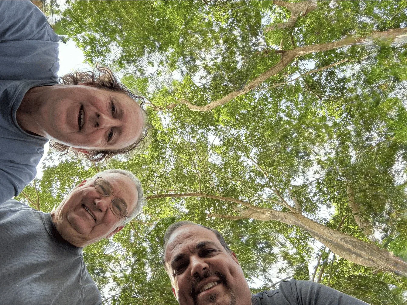 Three men at the AWWW8 retreat in Cambodia